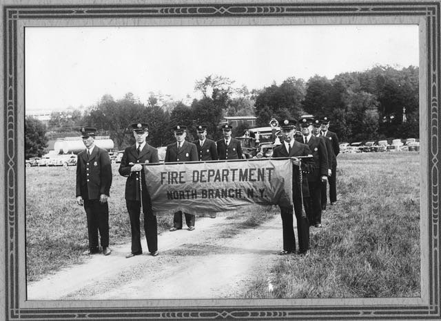 A vintage photograph records the early days of the NBVFD.